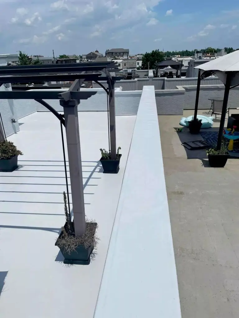 Acrylic Urethane Rooftop Deck Installation in South Philly — 20 year roof top deck